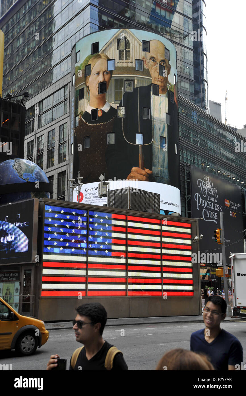 Grant Wood painting American Gothic appears on a digital billboard in New York's times Square during the Art Everywhere event. Stock Photo