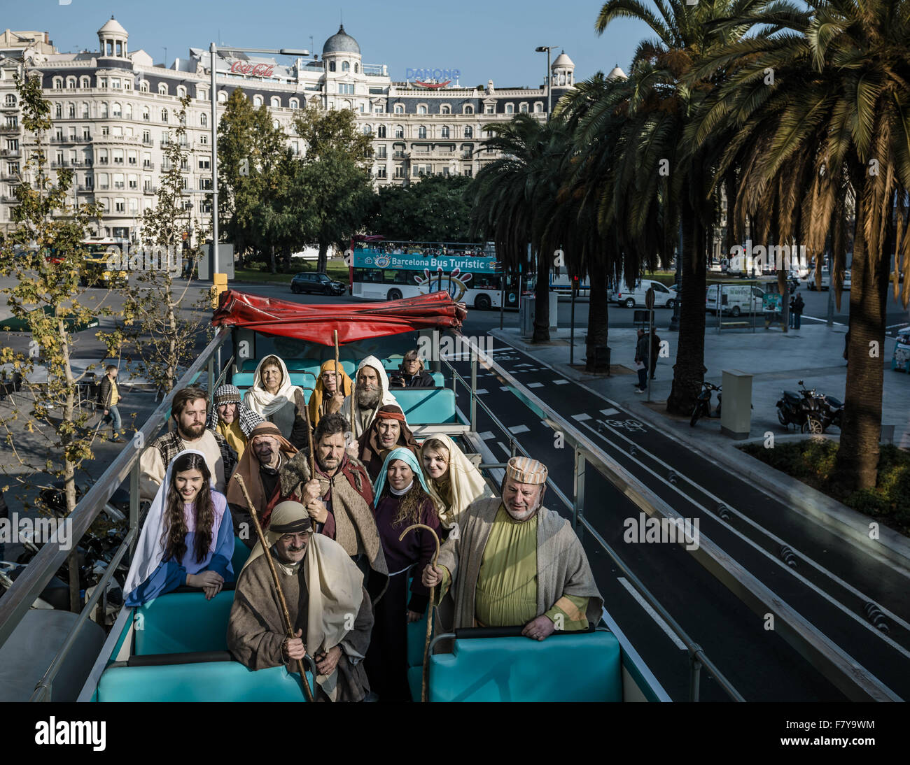 Barcelona, Catalonia, Spain. 3rd Dec, 2015. Shepherd performers of the 'pastorets', the traditional Catalan three part Nativity plays, visit Barcelona on the top of a tourist bus at the beginning of this years festival time. - The 'pastorets', an old Catalan tradition, tells the stories of Jesus birth, the battle of good (angel) vs. evil and a humorous piece about shepherds. © Matthias Oesterle/ZUMA Wire/Alamy Live News Stock Photo