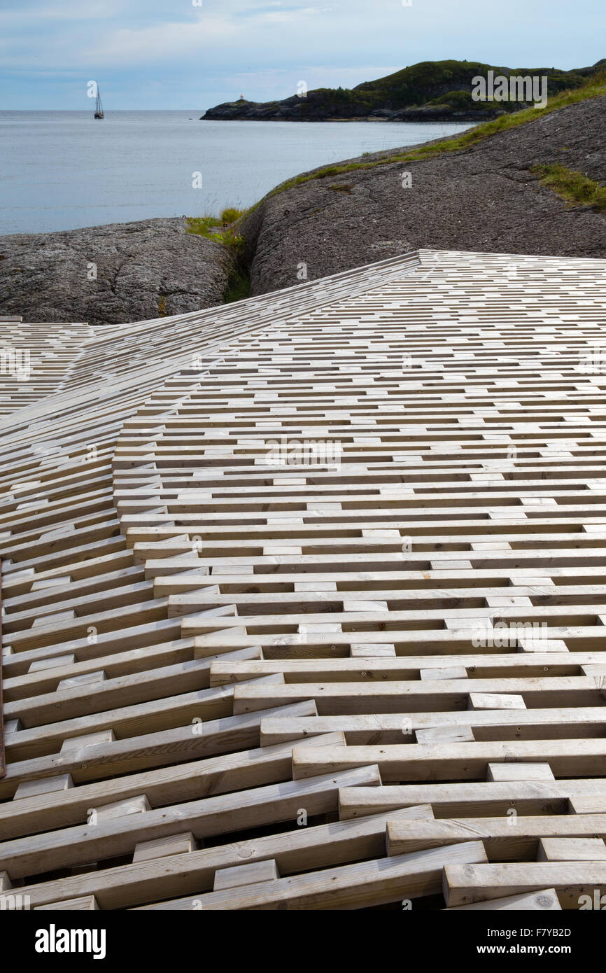 Wooden sunning terrace outside a health spa in the heritage fishing village of Nusfjord in the Lofoten Islands Norway Stock Photo