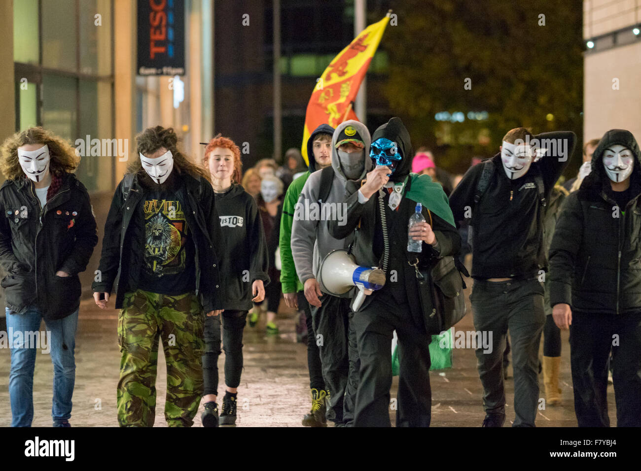 City Centre, Cardiff, Wales, UK, November 5, 2015: Anonymous activists gathers in front of Aneurin Bevan statue. Stock Photo