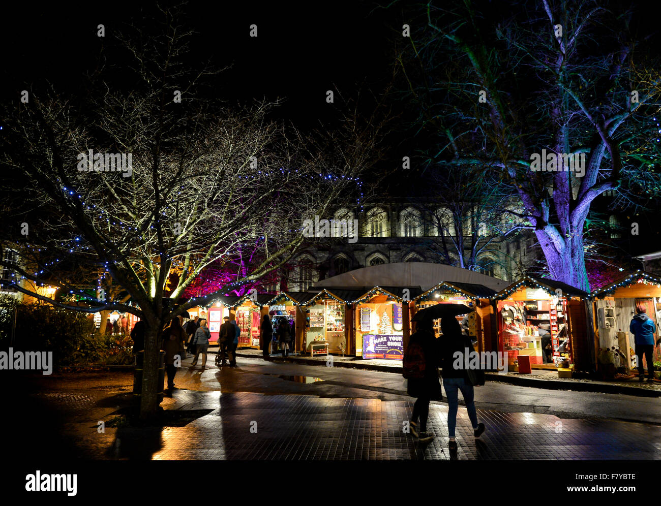 Winchester Christmas Market, Hampshire UK. Stalls of the annual Christmas market light up the