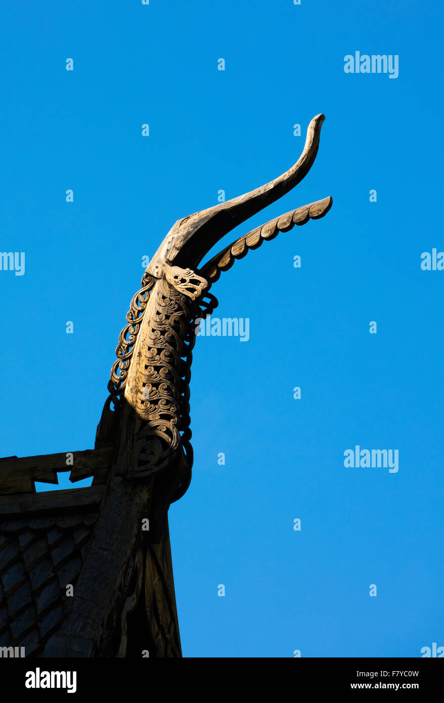 Dragon head figure on the roof of Lom stave church in Oppland central Norway Stock Photo