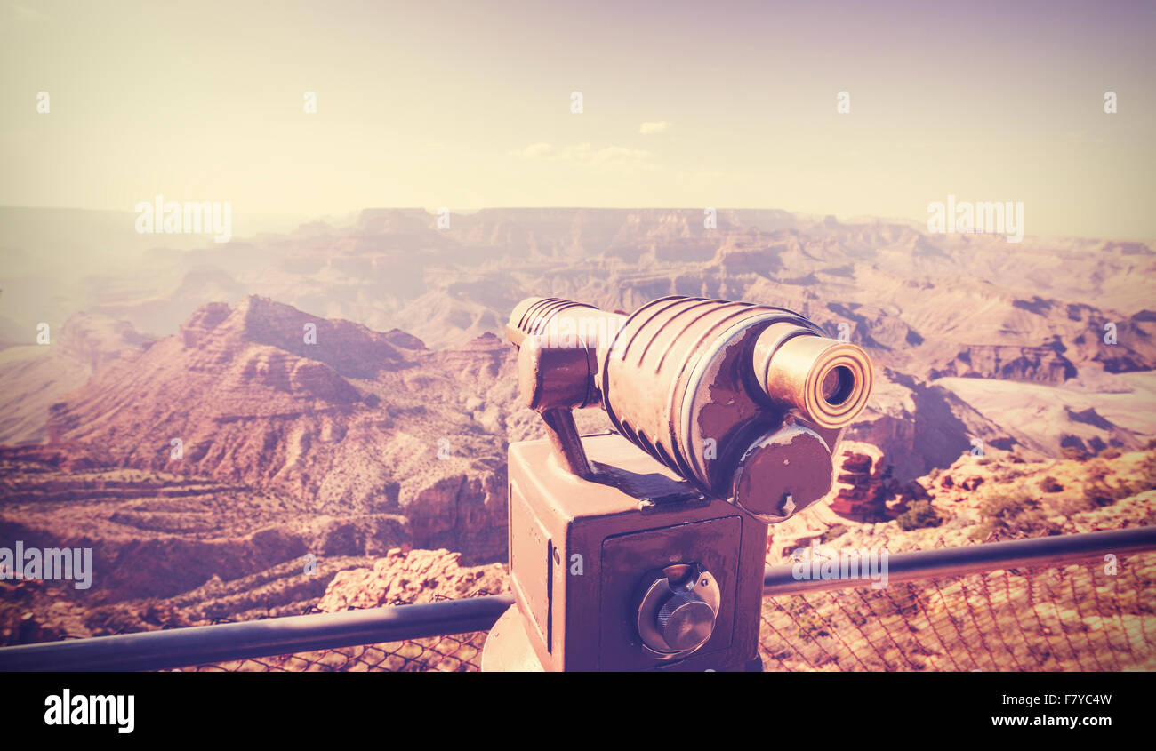 Vintage toned telescope pointed at Grand Canyon, travel concept, USA. Stock Photo