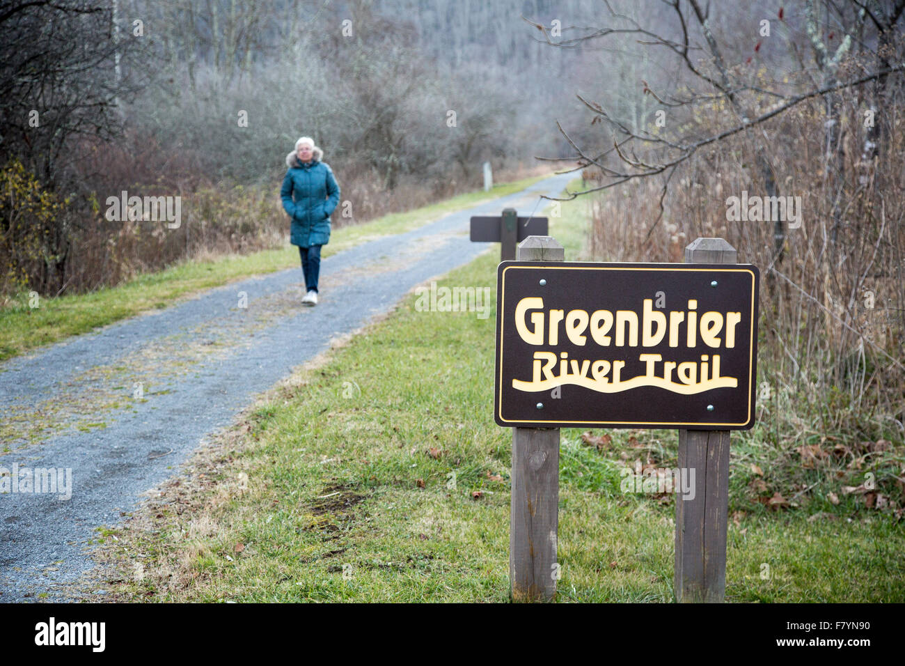 Cass, West Virginia - A woman hikes on the Greenbrier River Trail. Stock Photo