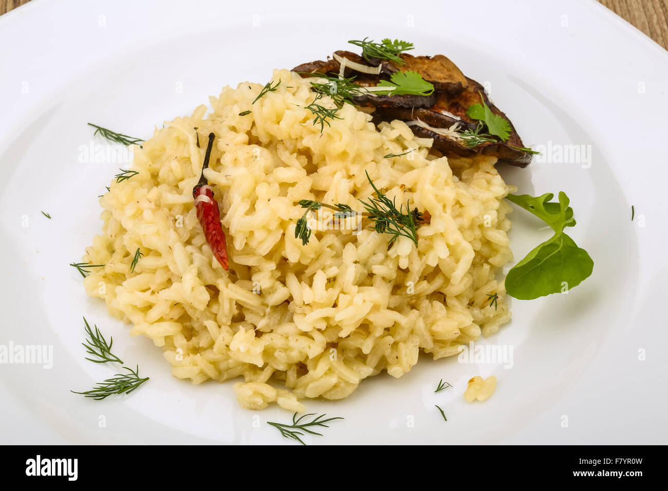 Italian trditional Risotto with eggplant and coriander Stock Photo Alamy