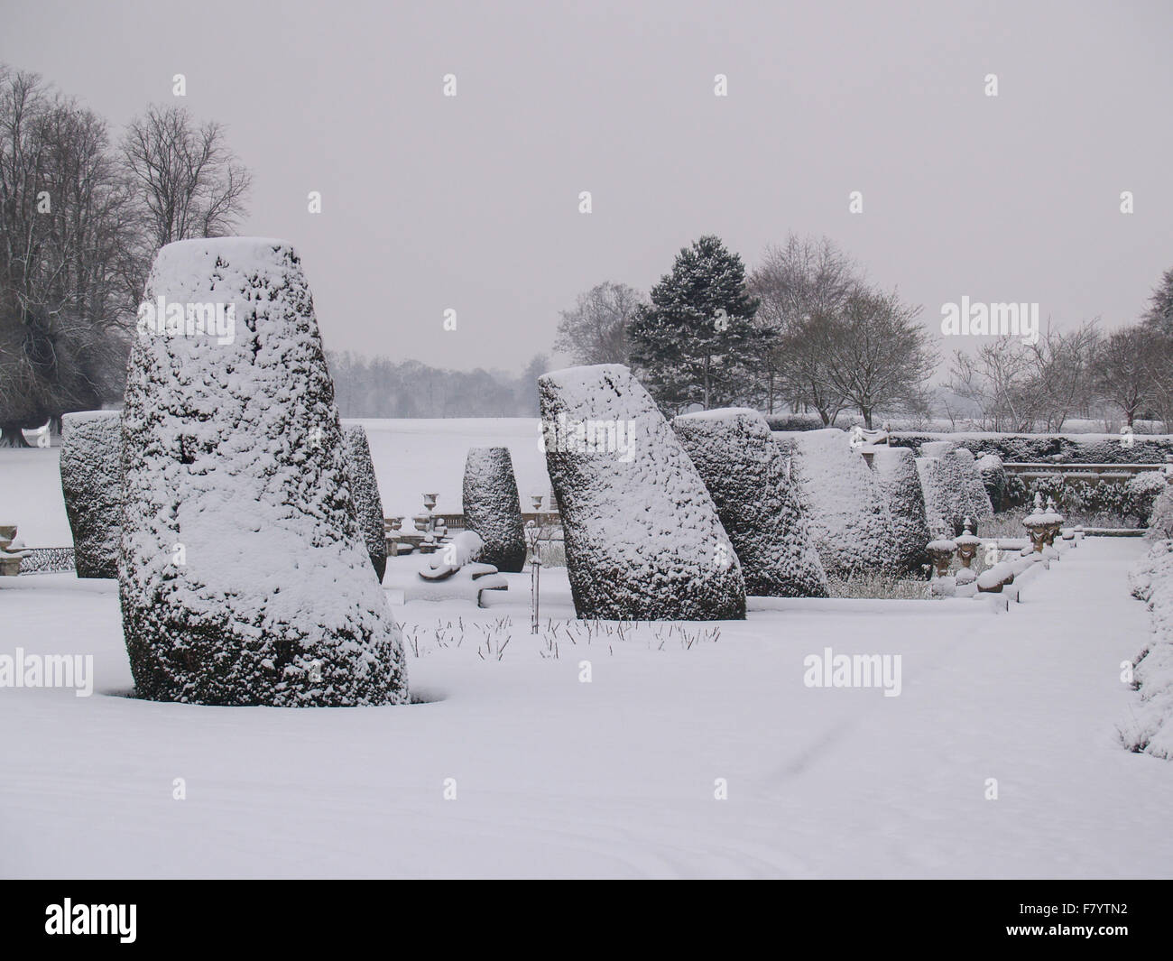 Wintery deep snow & ice covered gardens and terraces of English country