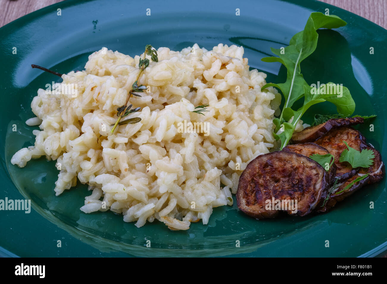 Italian trditional Risotto with eggplant and coriander Stock Photo Alamy