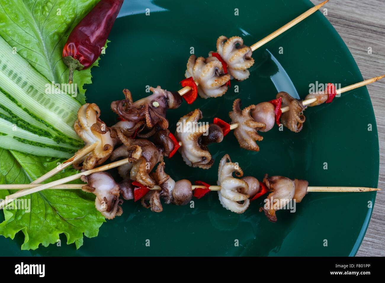Barbecue baby octopus with bell pepper and spices Stock Photo Alamy