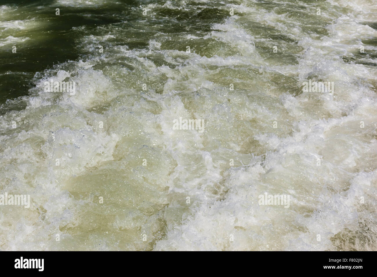 detail of turbid waters being flushed in the sea Stock Photo