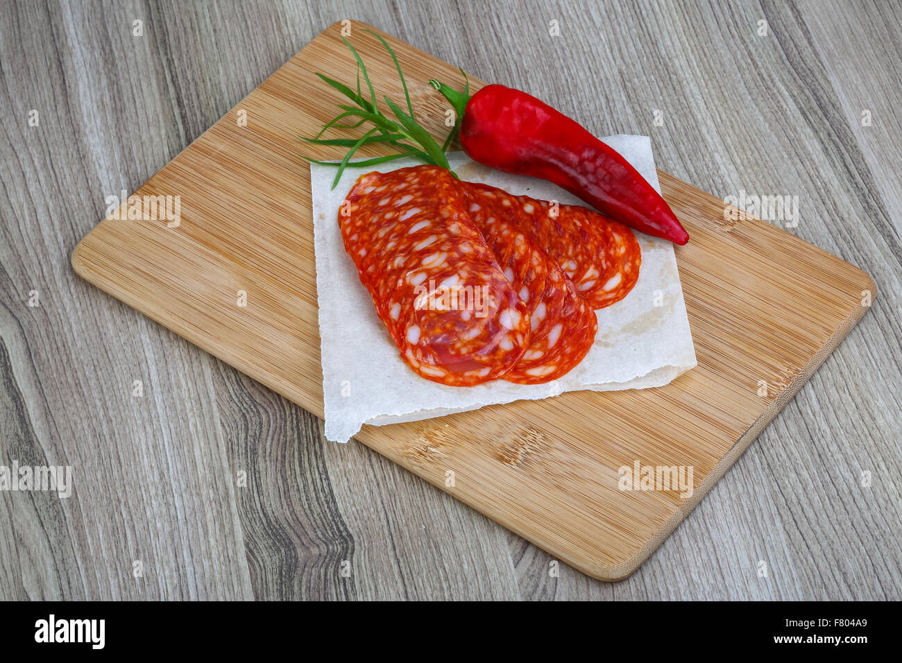 Spanish traditional sausages - Chorizo - with estragon leaves and hot ...