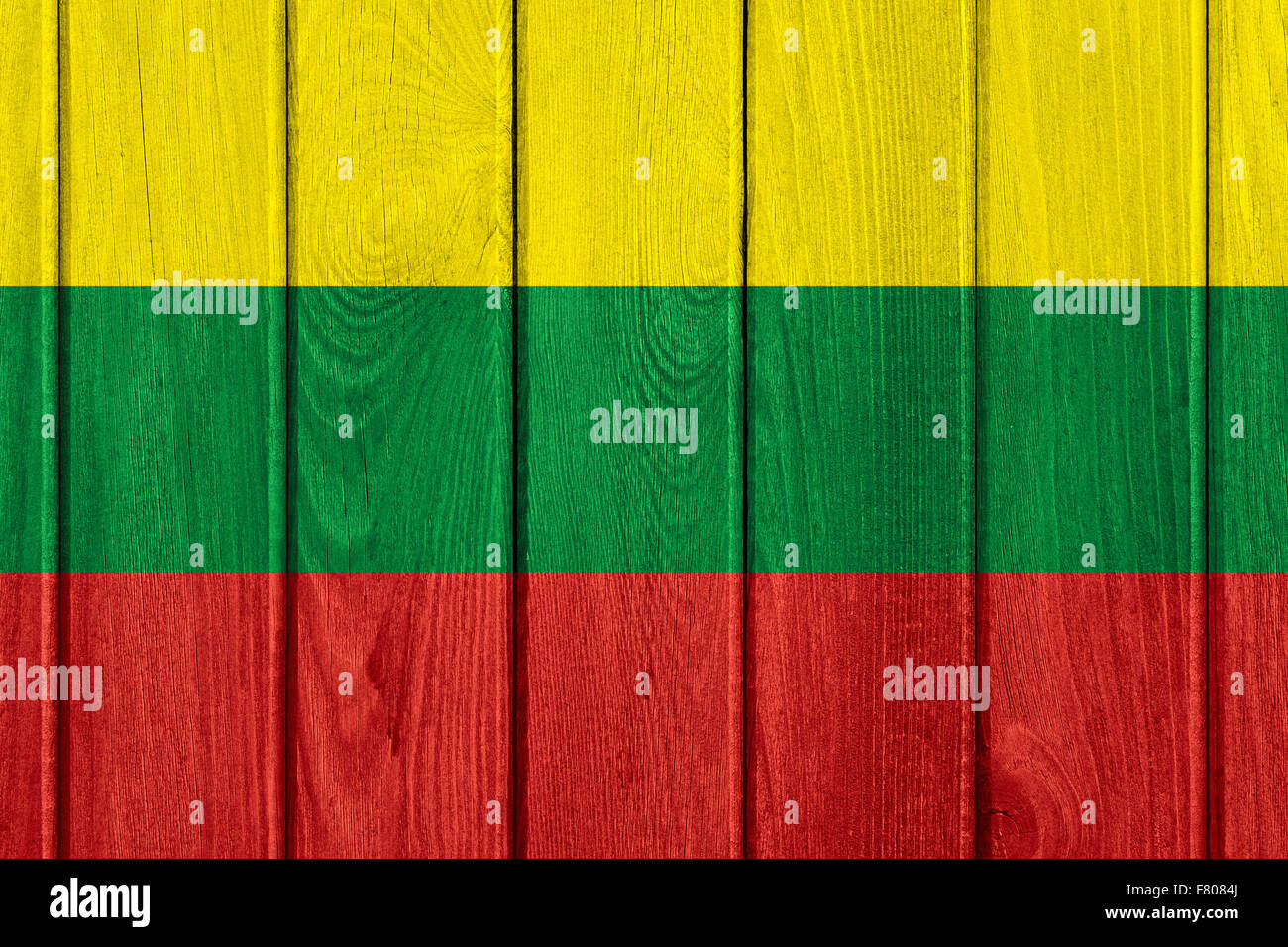 flag of Lithuania or Lithuanian banner on wooden background Stock Photo ...