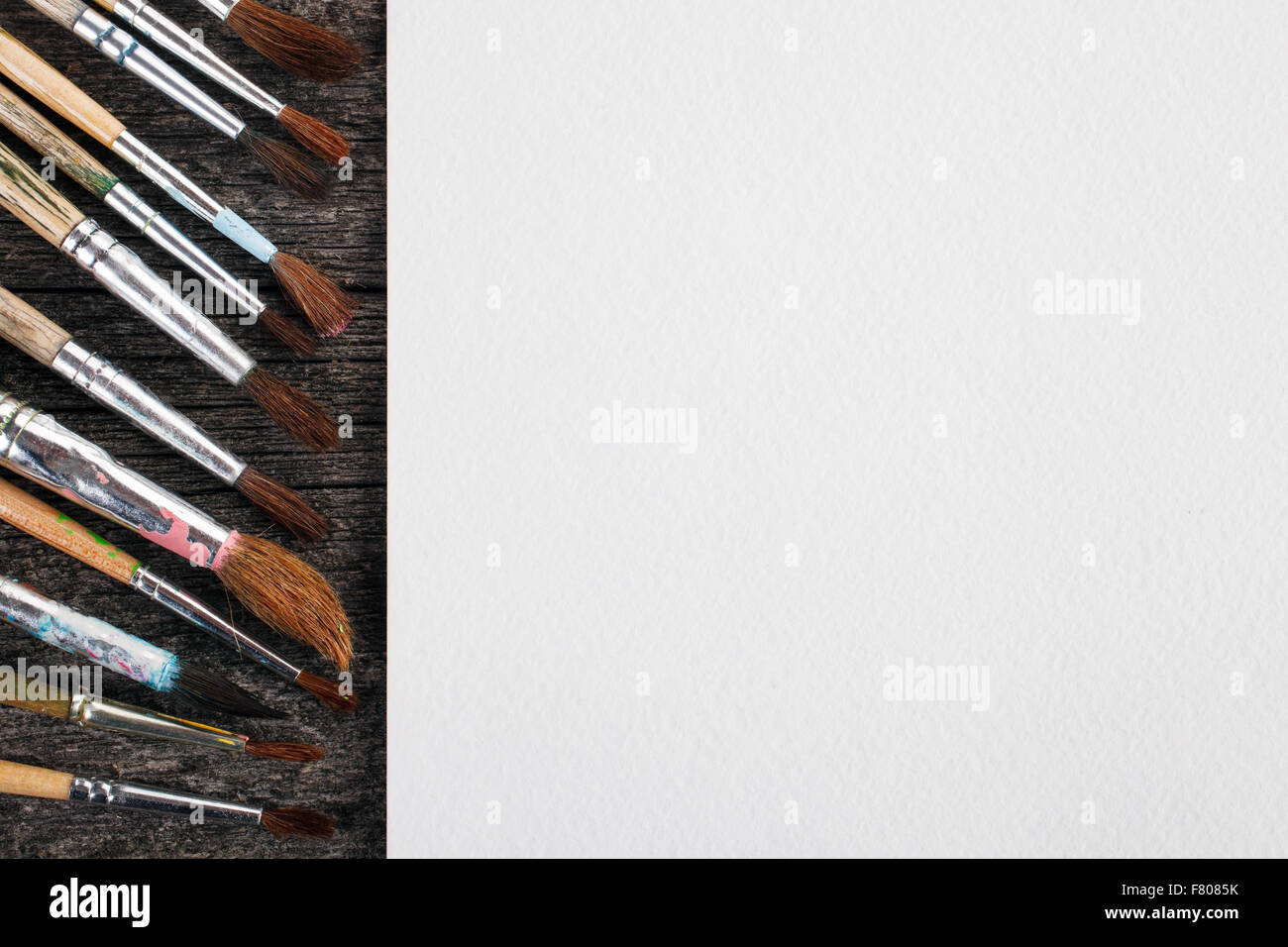 brushes for painting  and blank white paper sheet Stock Photo