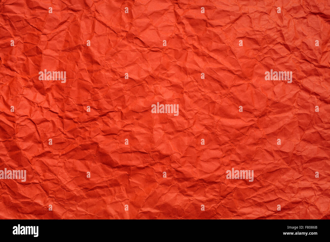 Detail of creased and wrinkled orange paper - Stock Image - F025/4940 -  Science Photo Library