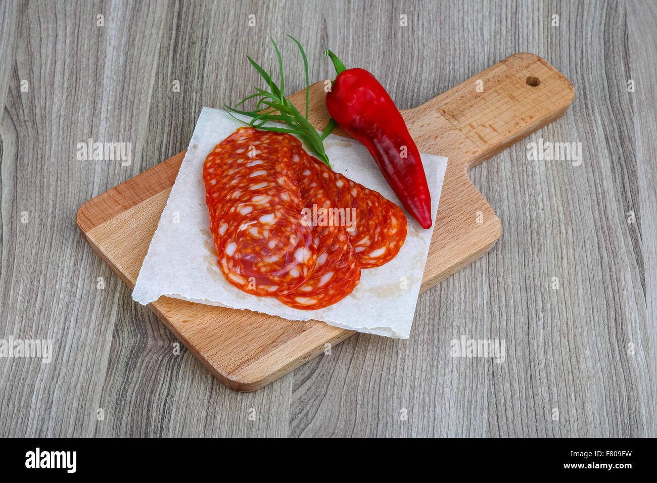 Spanish traditional sausages - Chorizo - with estragon leaves and hot ...
