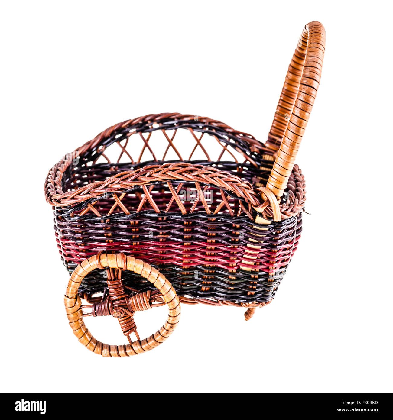a small wicker cart isolated over a white background Stock Photo