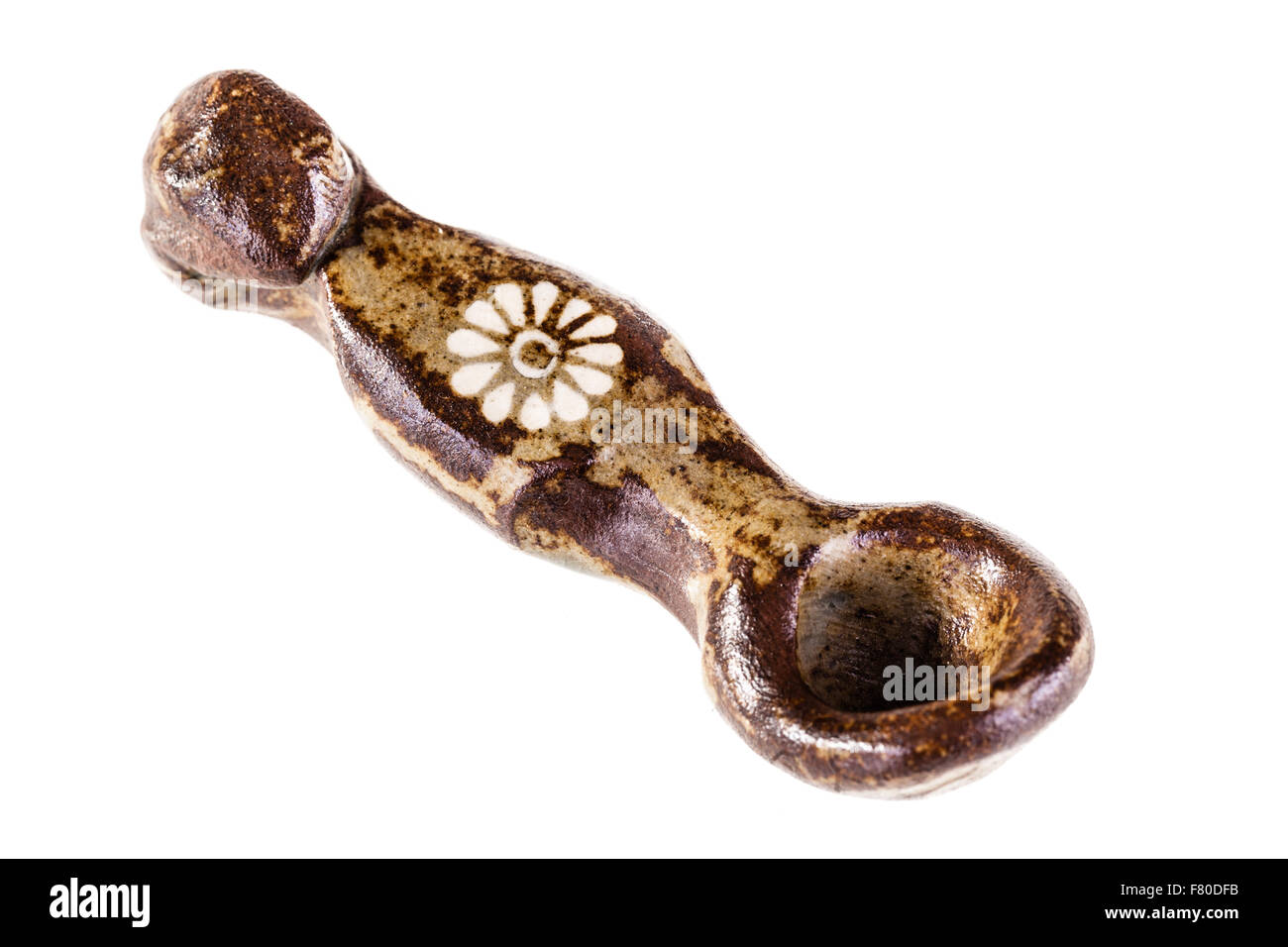 an ancient peruvian stone spoon archaeological find isolated over a white background Stock Photo