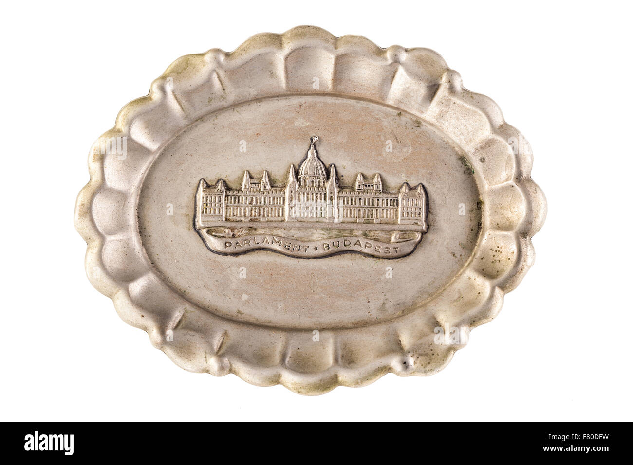 a small metal tray souvenir with the Budapest parliament engraved isolated over a white background Stock Photo