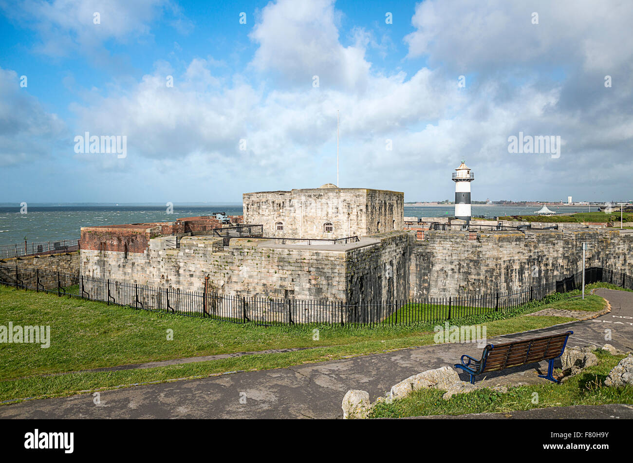 Southsea Castle and lighthouse seen from Southsea Commons, Portsmouth, England, UK Stock Photo
