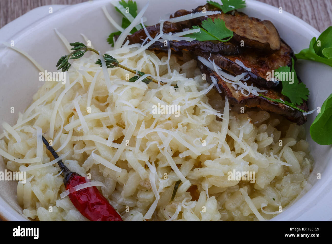 Italian trditional Risotto with eggplant and coriander Stock Photo Alamy