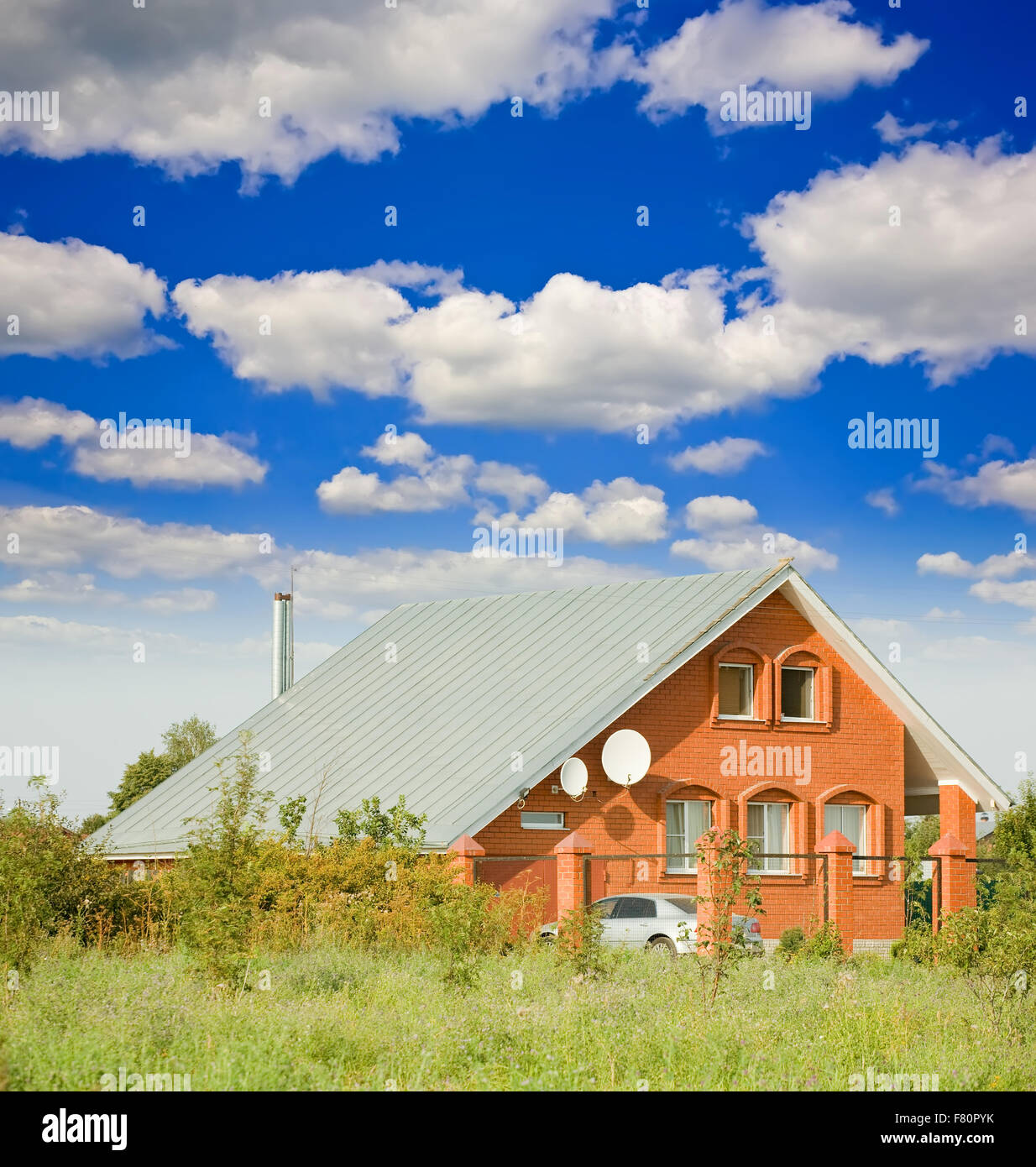 red brick dwelling house under cloudy sky Stock Photo Alamy