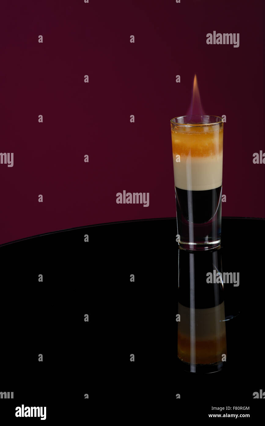 B 52 cocktail with flame Stock Photo