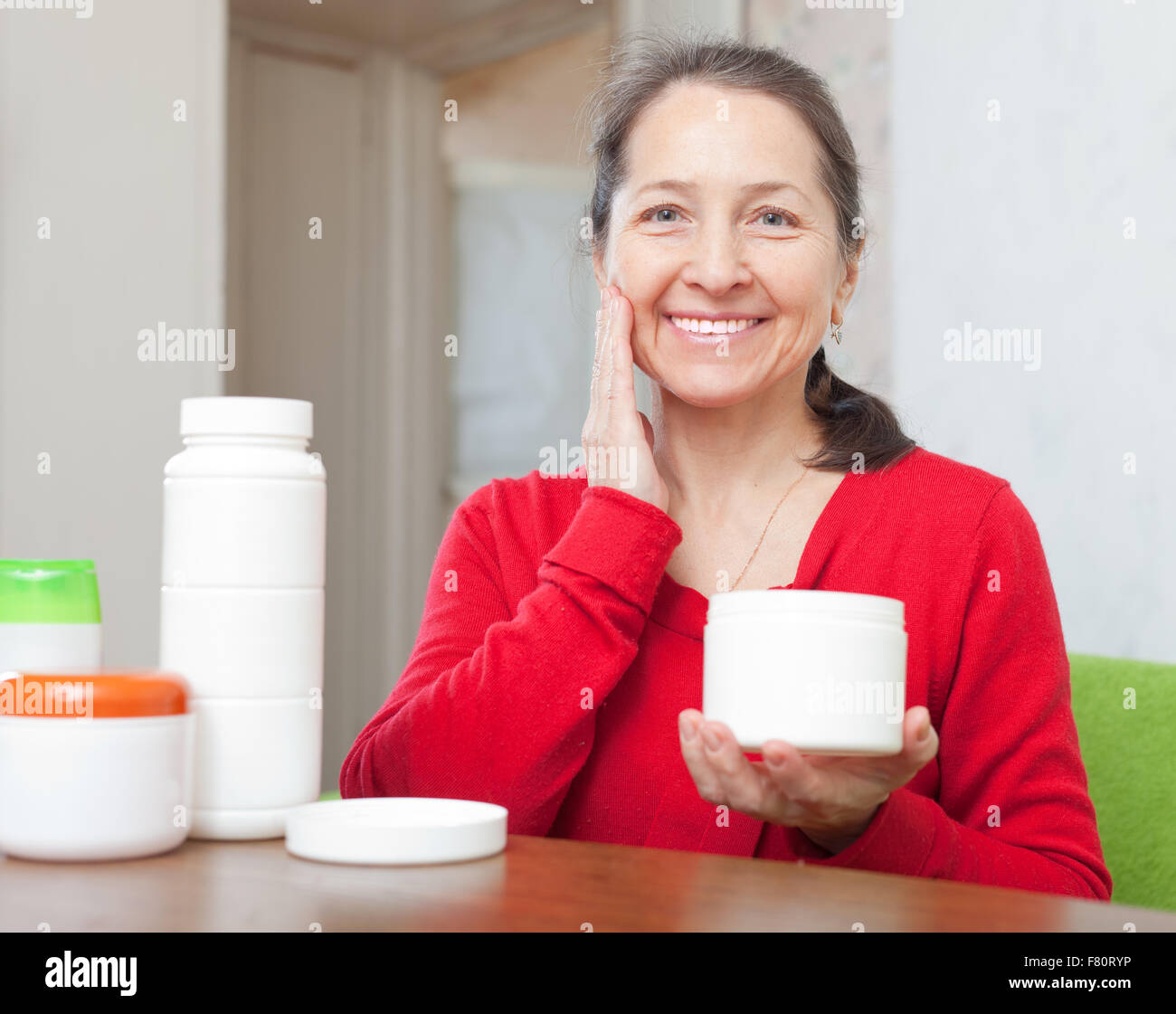 Mature woman face mask smile spa hi-res stock photography and images ...