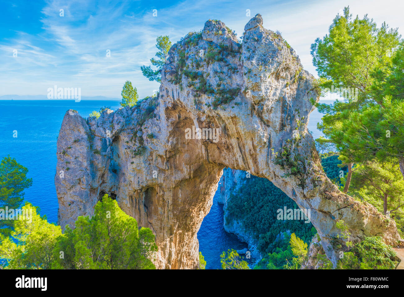 The Arch, quadriple natural arch on cliffs above Capri and Tyrrhenian Sea, Italy Stock Photo