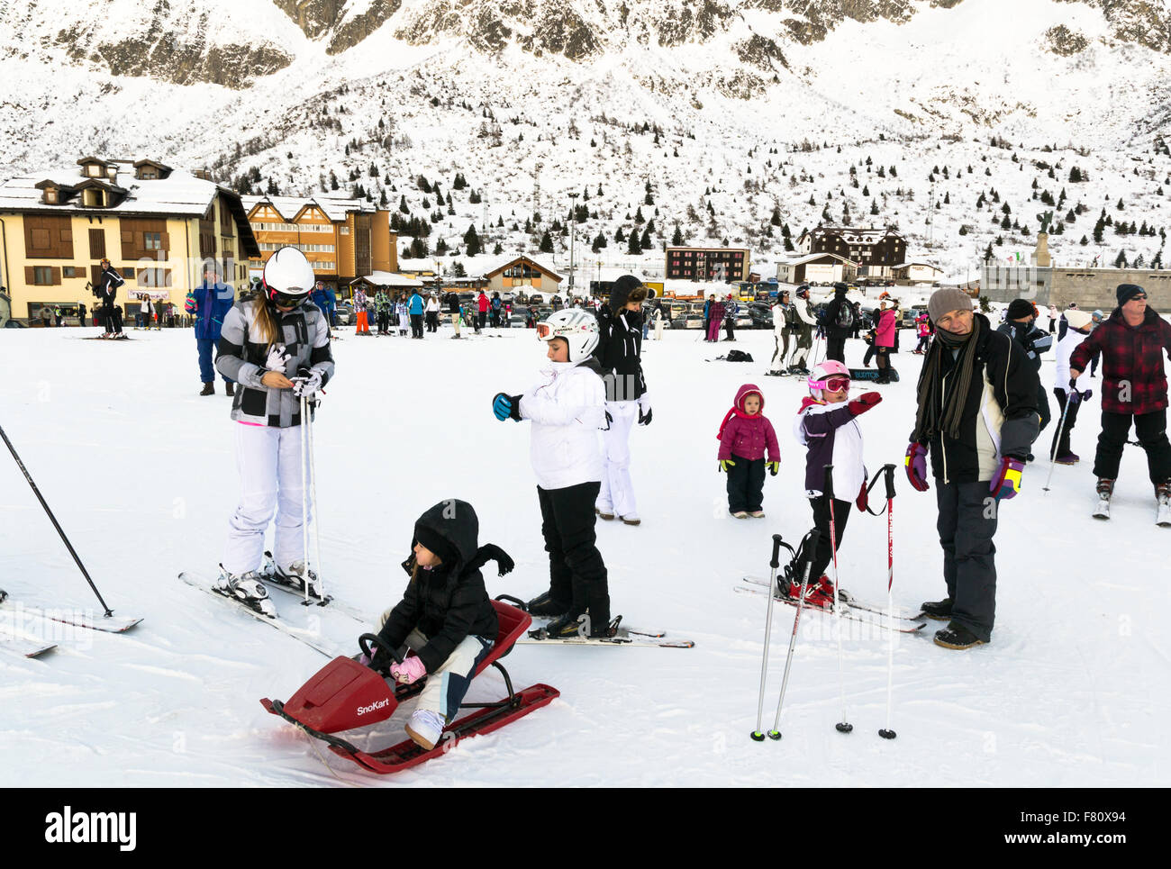 PONTE DI LEGNO, ITALY - DECEMBER 25: Families on holiday on the slopes of the Italian Alps on Thursday, December 25, 2014. Stock Photo
