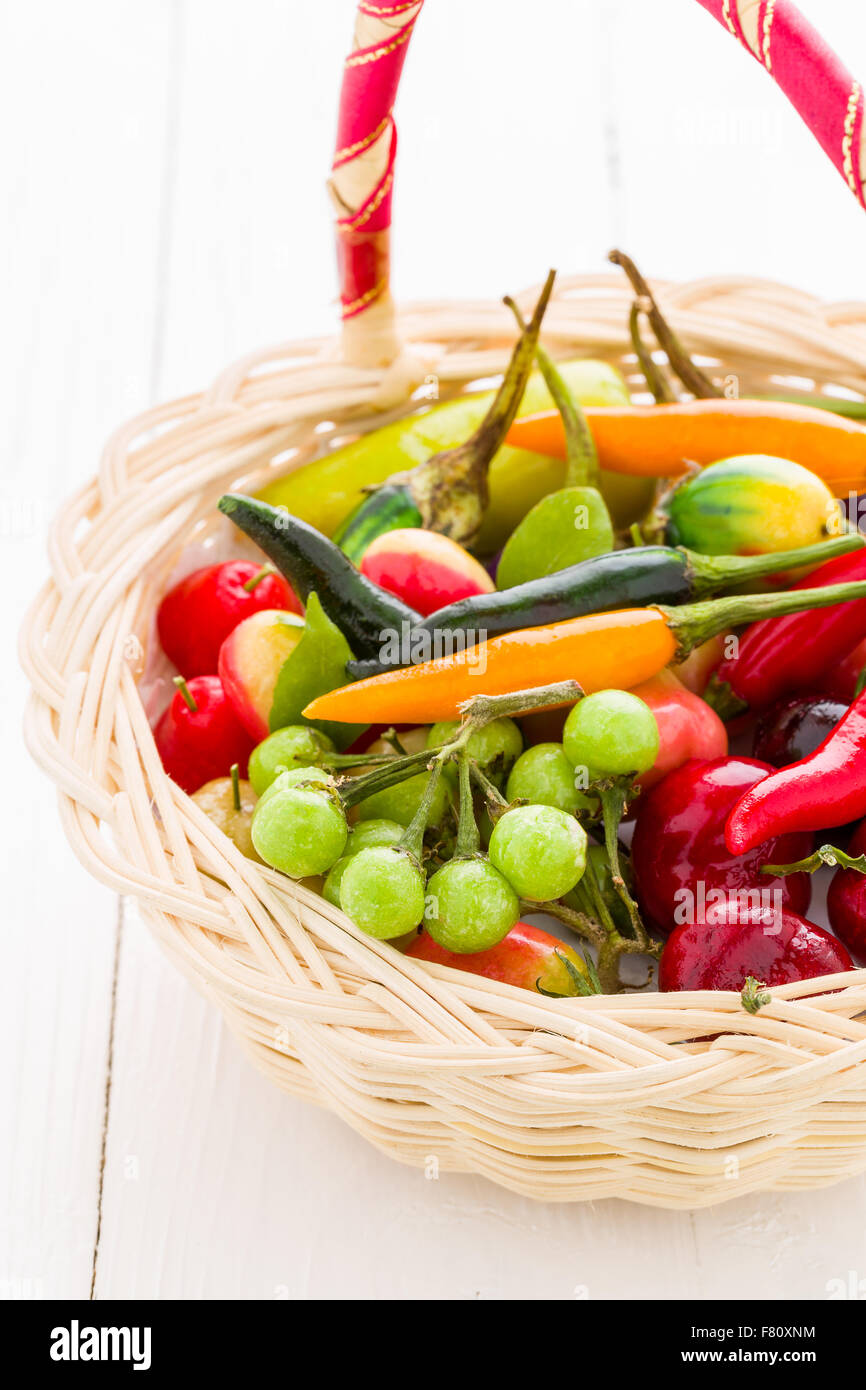 Various kinds of vegetable in wooden basket. Stock Photo