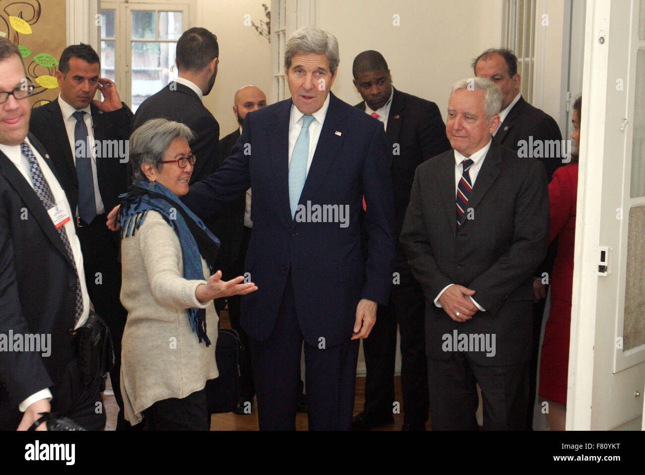 Athens, Greece. 4th Dec, 2015. U.S. Secretary of State John Kerry through  the process of filling welcome kits for refugee children, at the Melissa  Network, which promotes empowerment of migrant women. Kerry