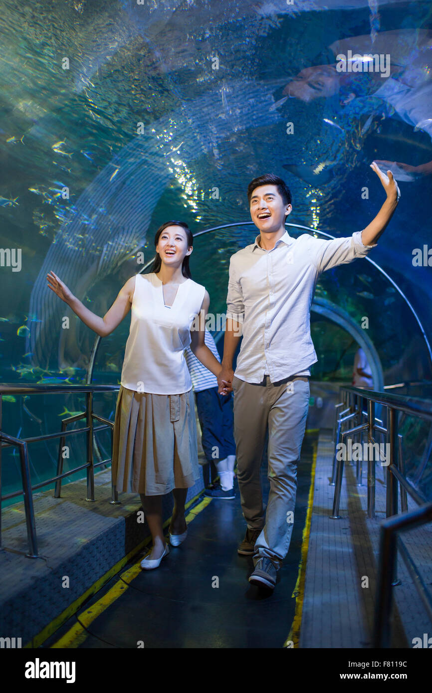 Young couple in aquarium Stock Photo