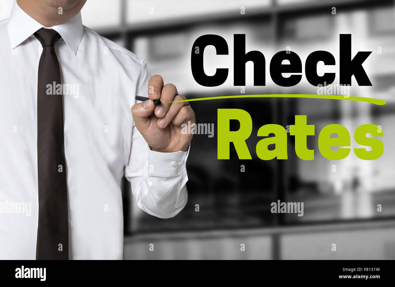 Check Rates written by businessman background concept. Stock Photo