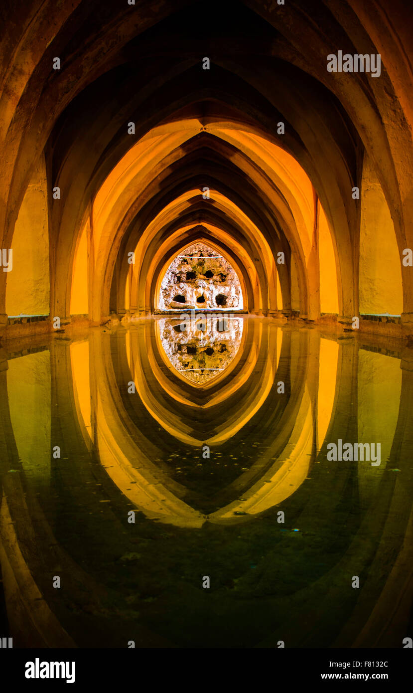 The 'Baths of Lady María de Padilla' are rainwater tanks beneath the Patio del Crucero. Stock Photo