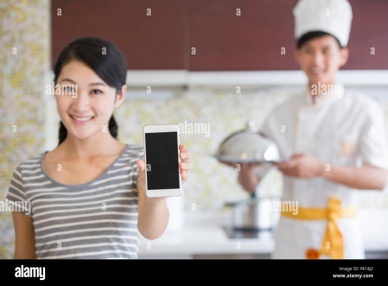Chef providing cooking service in customer's home Stock Photo Alamy