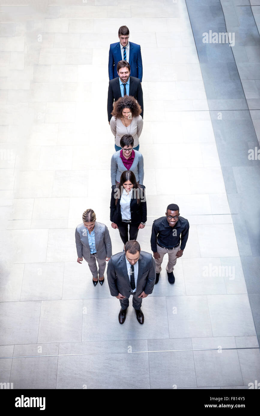 young multi ethnic business people group walking standing and top view ...