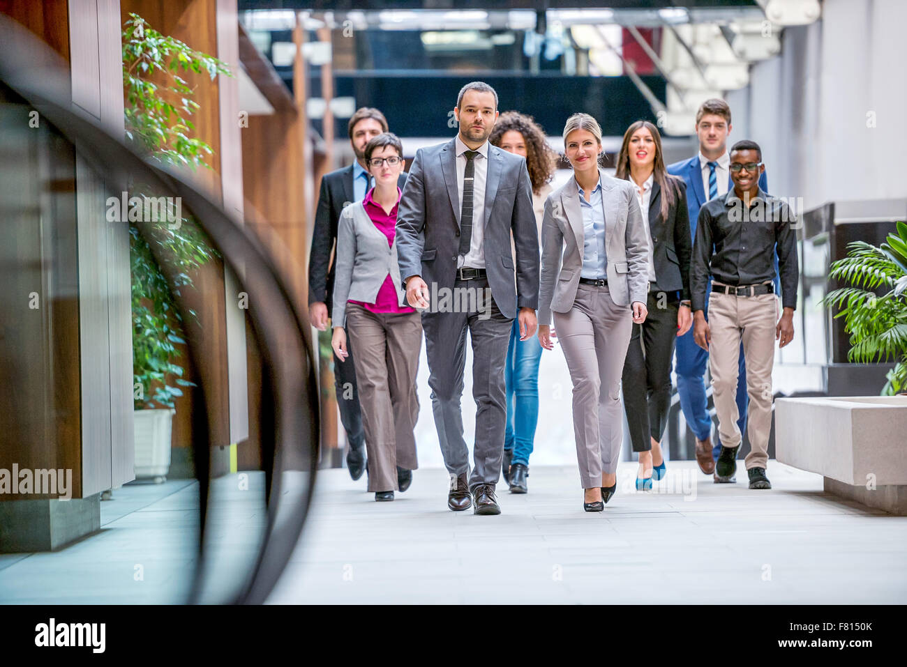 young multi ethnic business people group walking standing and top view ...