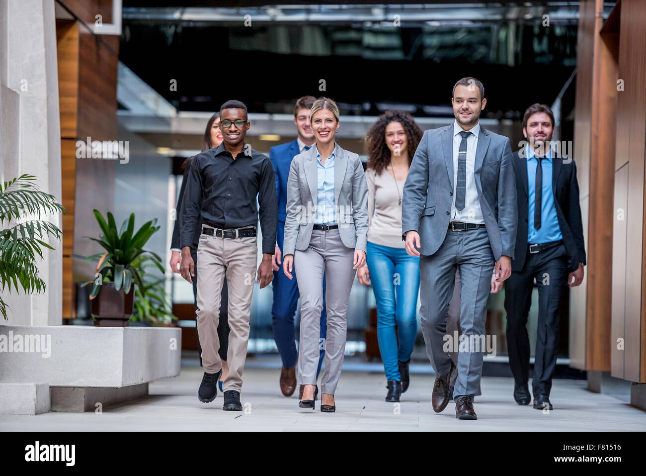 young multi ethnic business people group walking standing and top view ...