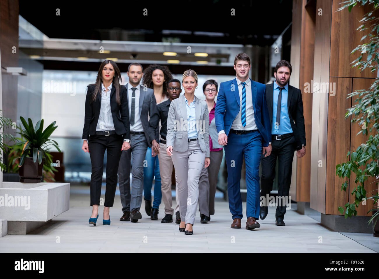 young multi ethnic business people group walking standing and top view ...