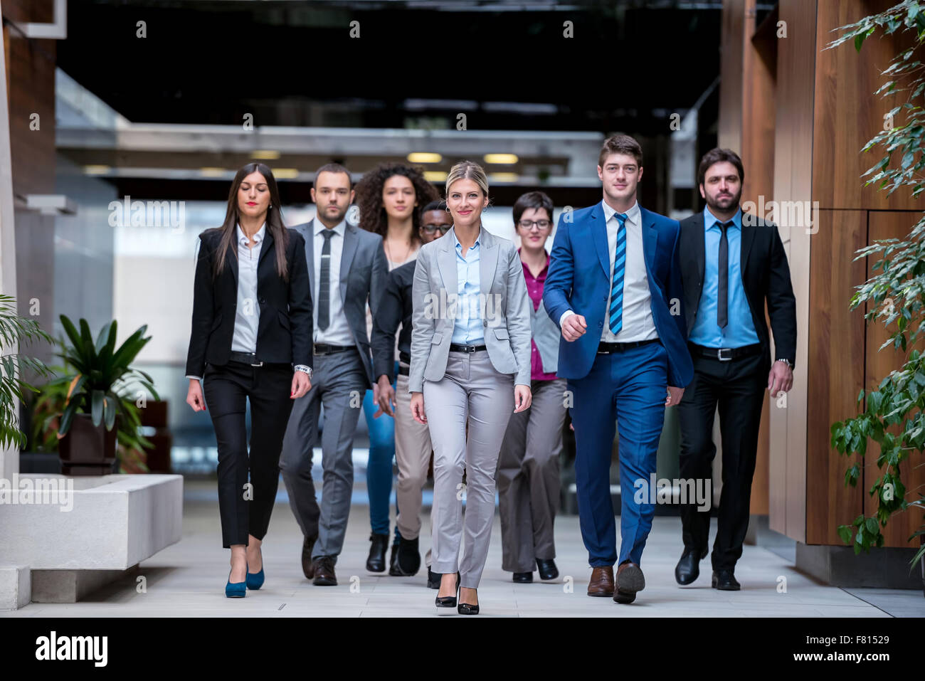 young multi ethnic business people group walking standing and top view ...