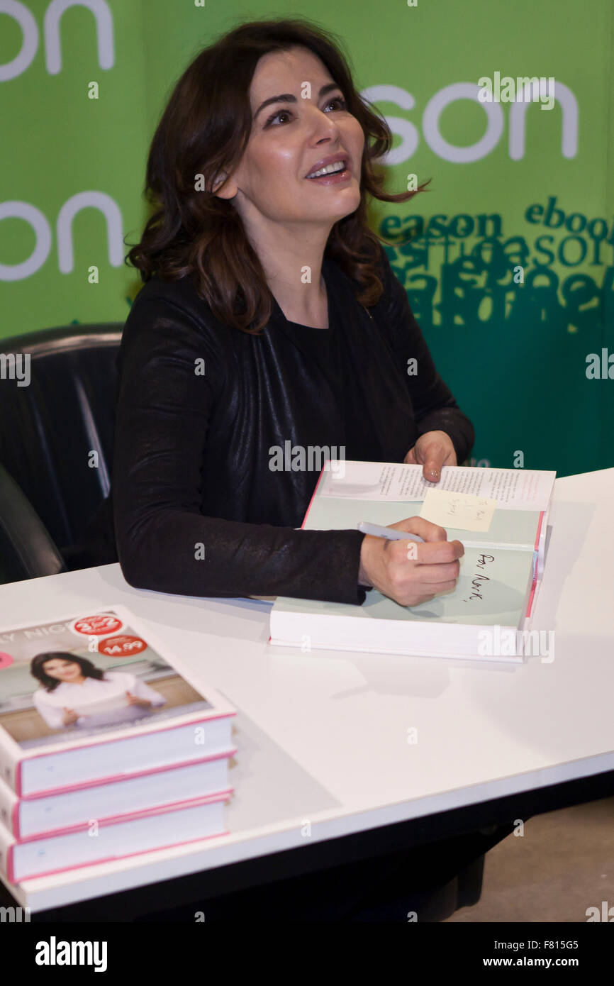 Easons, Donegal Place, Belfast, UK. 4th December, 2015. Celebrity Chef Nigella Lawson was in Belfast signing copies of her new Recipe book 'Simply Nigella'. There was a large queue of people which attended the signing Credit:  Bonzo/Alamy Live News Stock Photo