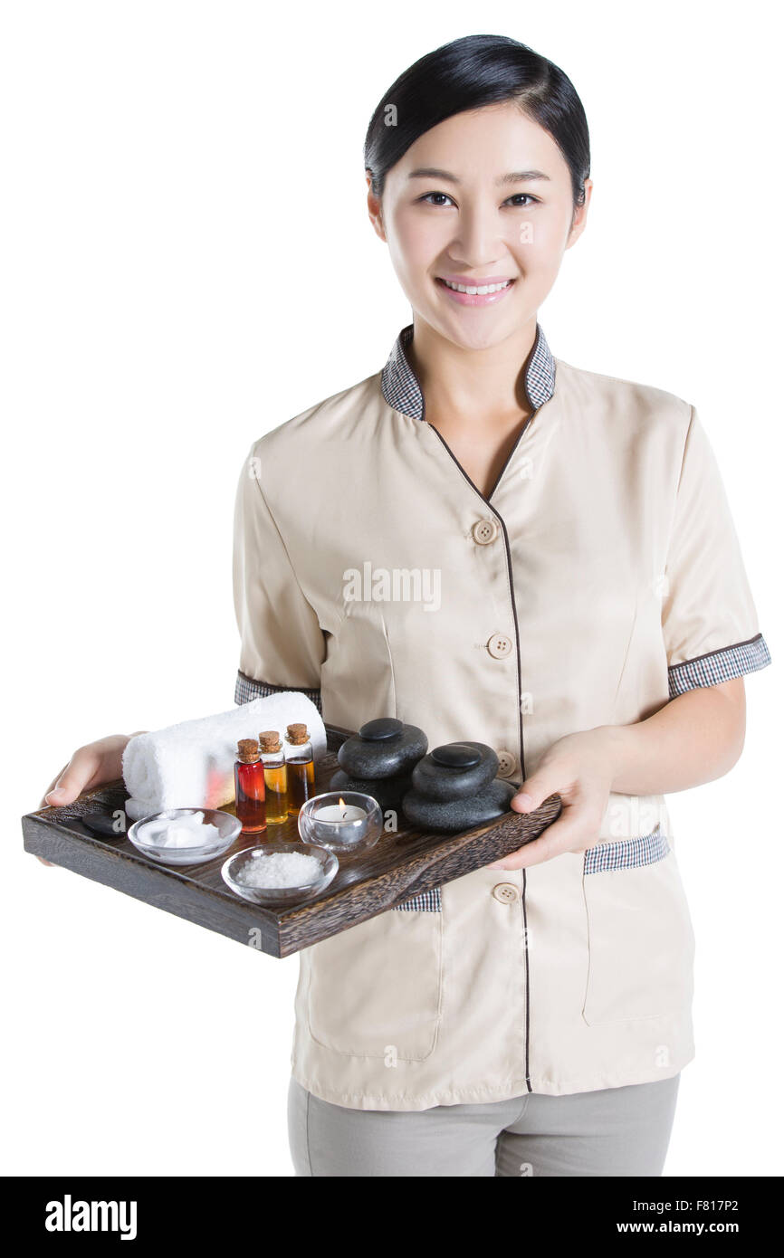 Massage therapist holding massage supplies Stock Photo Alamy