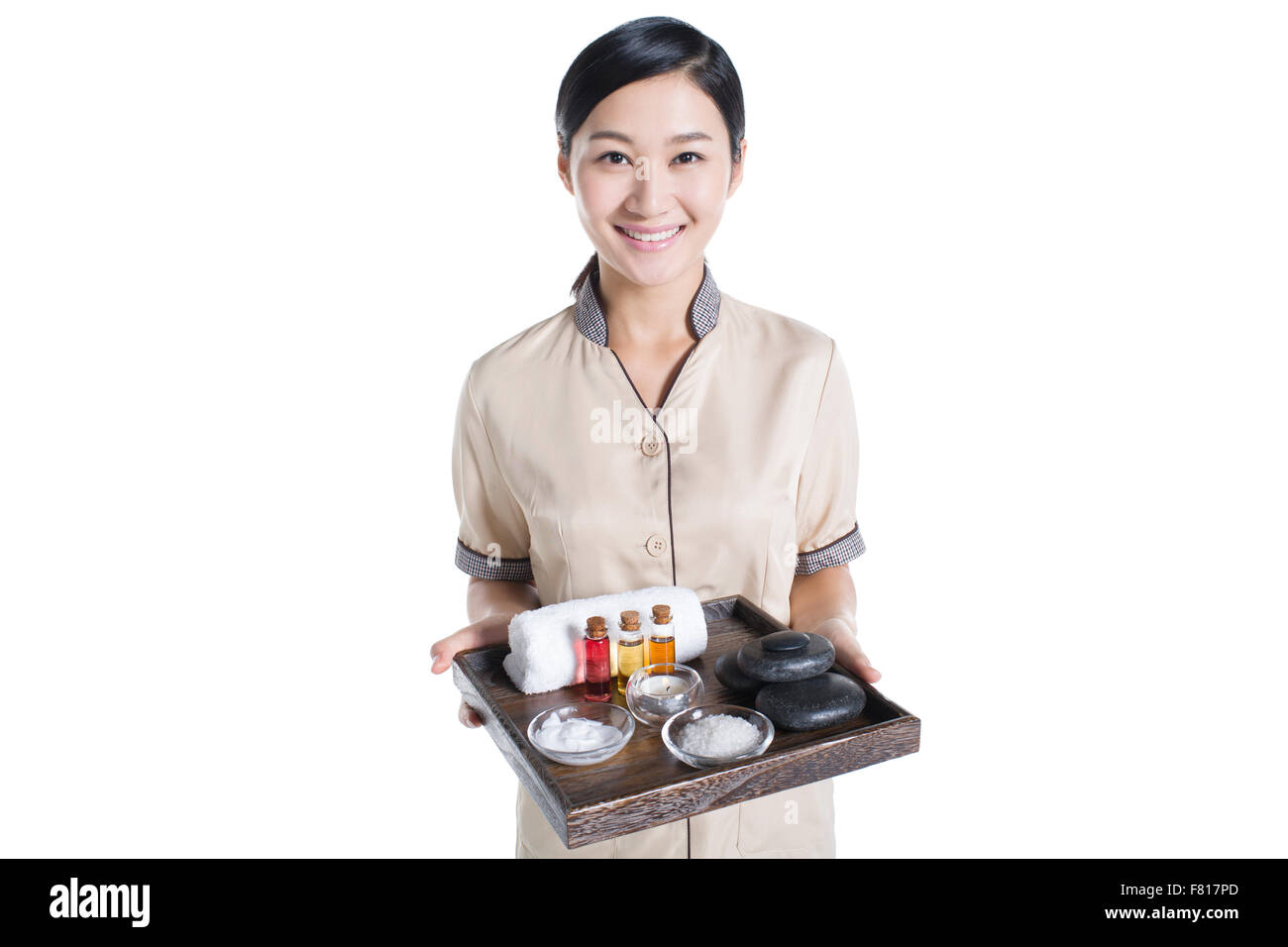 Massage therapist holding massage supplies Stock Photo Alamy