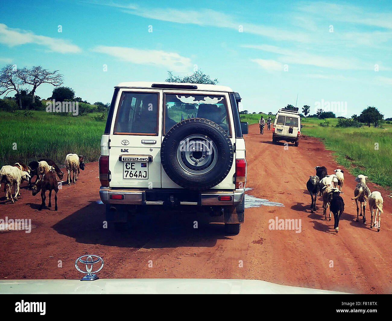 Warrup, South Sudan. 28th Sep, 2015. An NGO Toyota Land Cruiser negotiates a dirt road on the way to Kuajok from Wau in Warrap State of South Sudan Sept 19, 2015. Photos Andre Forget © Andre Forget/ZUMA Wire/Alamy Live News Stock Photo