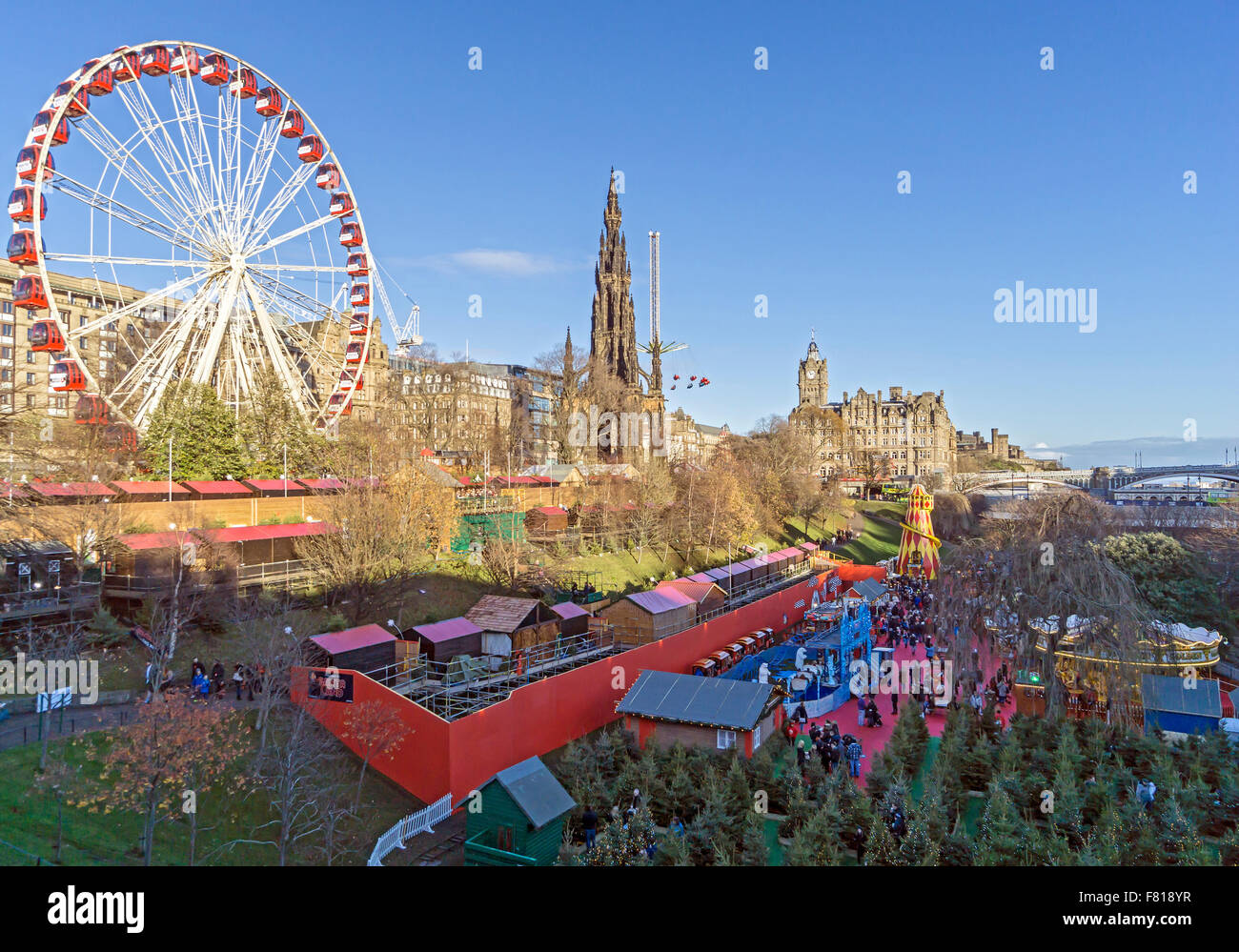 Edinburgh Christmas market 2015 with market stalls Big Wheel and Star Flyer as well as Santa Land bottom right Stock Photo