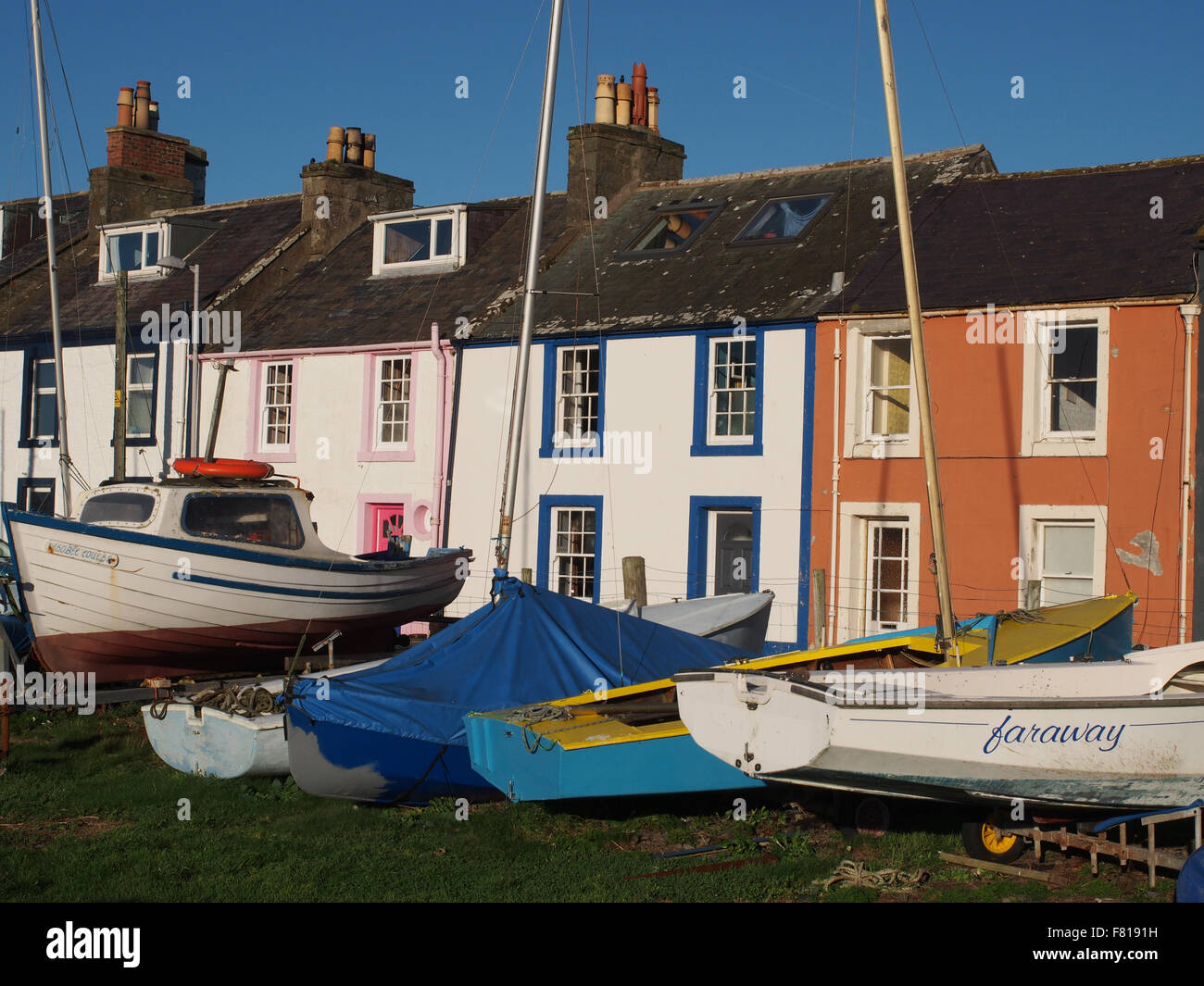 Colourful houses on the harbour at the village of Isle of Whithorn in Dumfries and Galloway, Scotland. Stock Photo