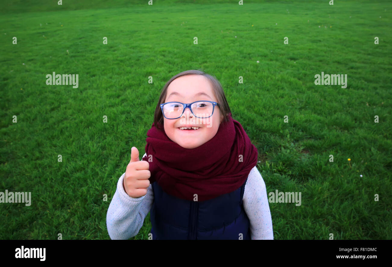 Portrait of beautiful girl with glasses in the park Stock Photo - Alamy