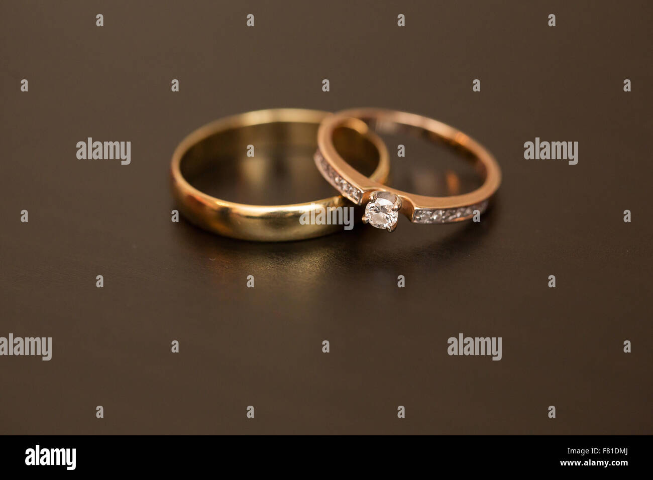 gold wedding rings on a table Stock Photo