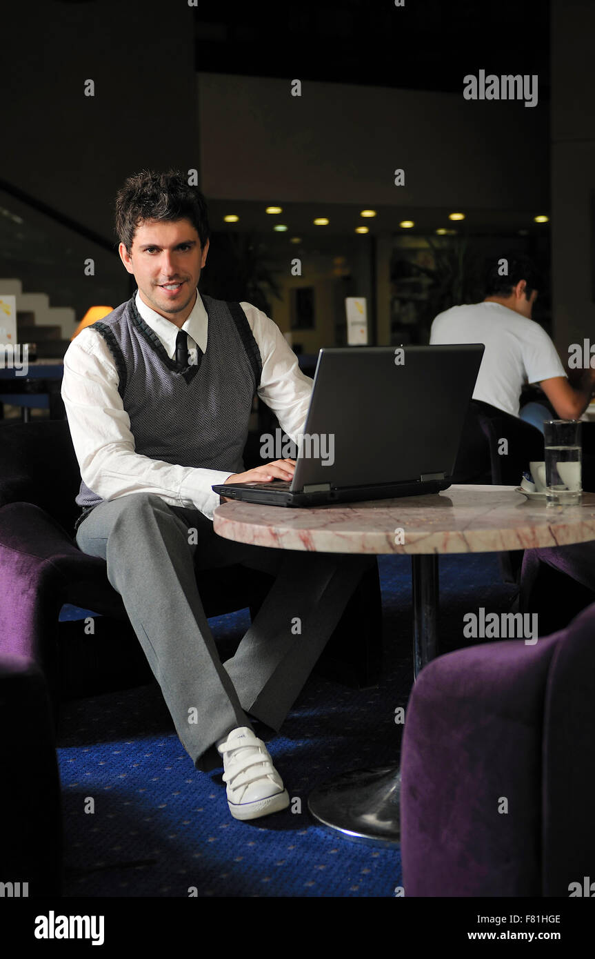 Relaxed adult man sitting hi-res stock photography and images - Alamy