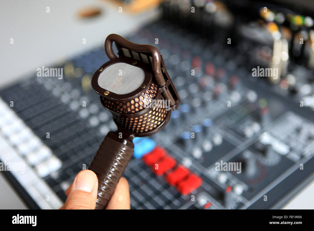 recording microphone & audio mixer used by video & audio editors, sound engineers at radio or tv stations.. Stock Photo
