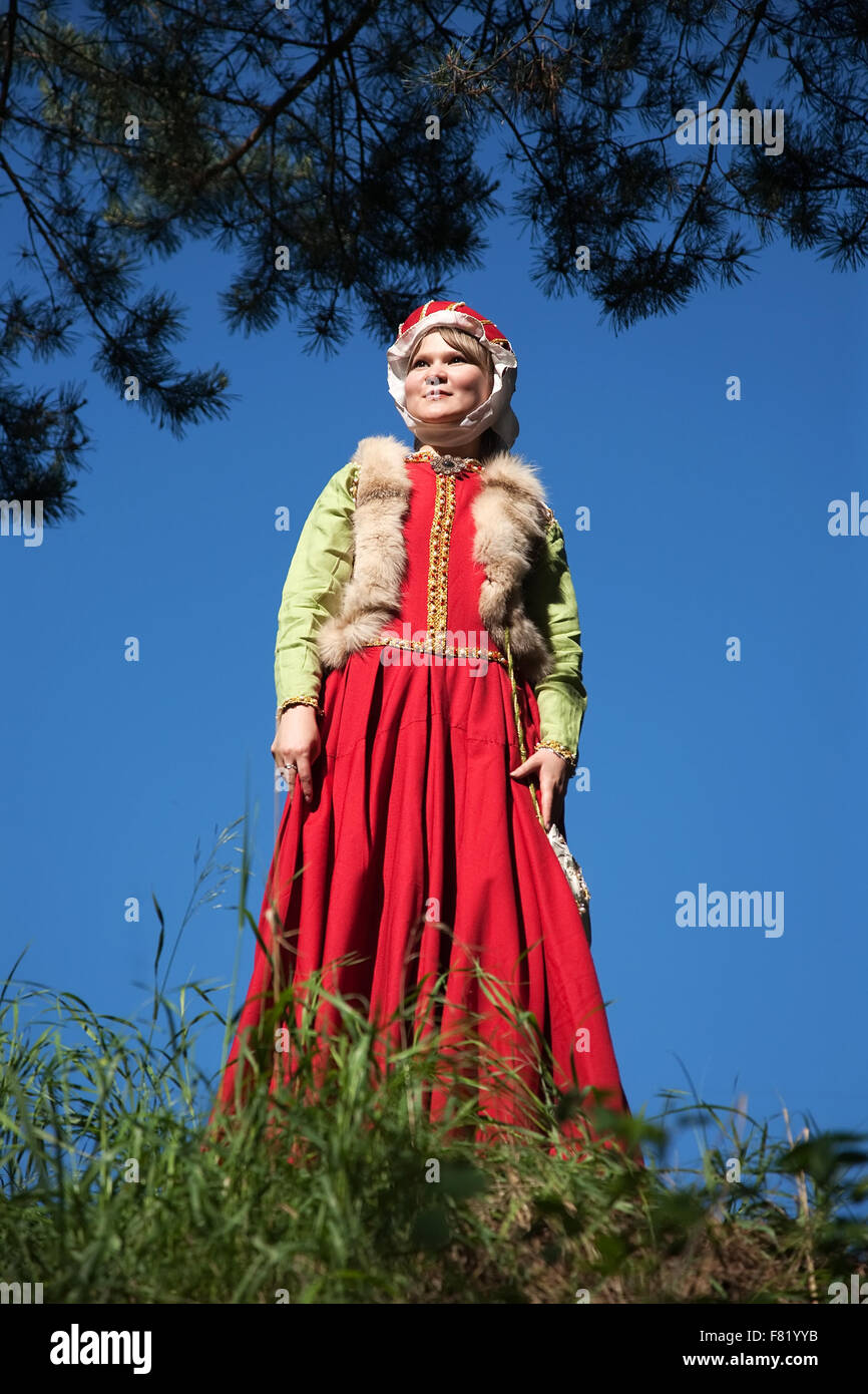 girl in european historical clothing  of XIII century at nature Stock Photo
